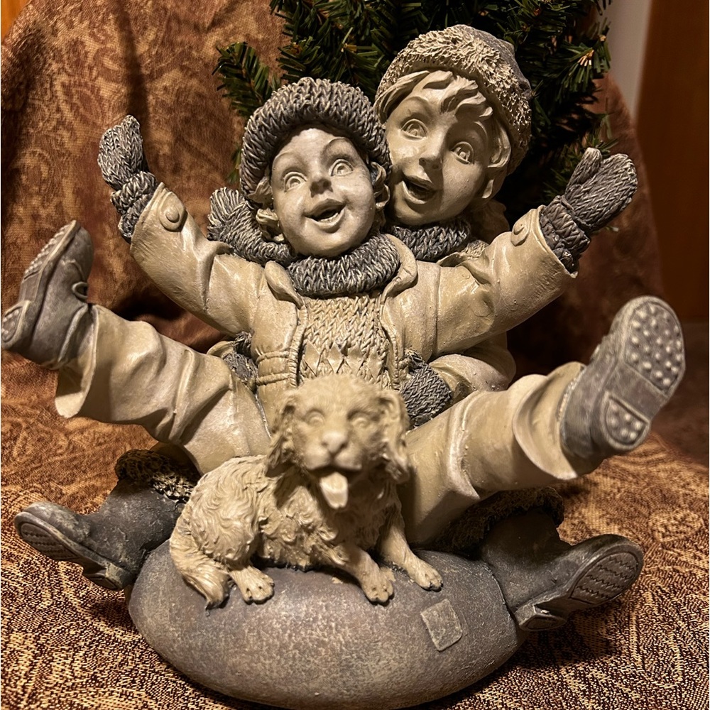 Jaimy Resin Statue; 2 children & Puppy on a Snow Tube